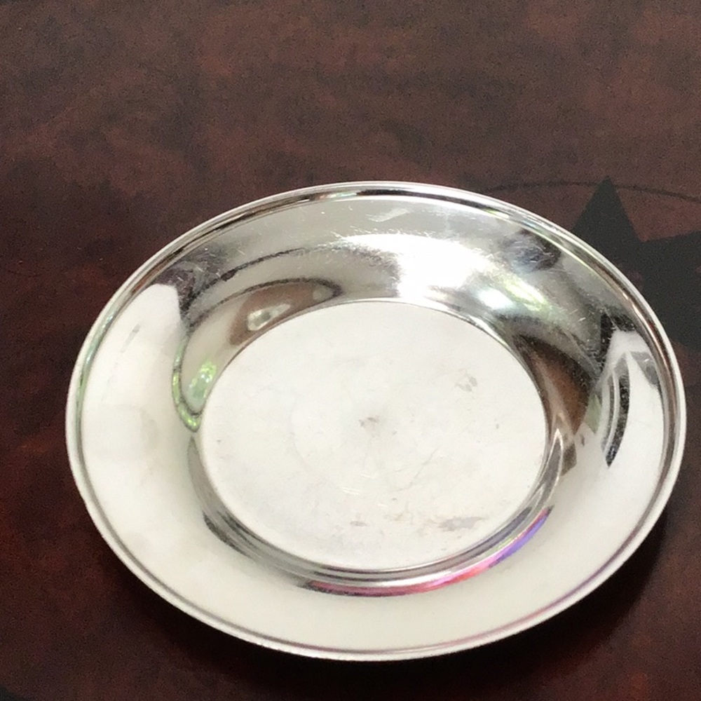 Small silver tone plate